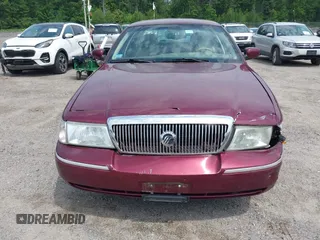 2005 Mercury Grand Marquis LS Premium z VIN 2MEHM75W05X636003, wystawiony jako IAAI lot #42480277 z przebiegiem 224 789 mil mil oraz . Historia ofert i sprzedaży dostępna na DreamBid. Obrazek 13.