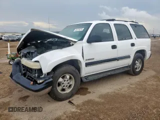 2001 Chevrolet Tahoe LT with VIN 1GNEC13T21R146378, listed as a Copart auction lot 62274075 with 201,658 mi miles and Salvage title. Bid and sale history available at DreamBid. Image 1.