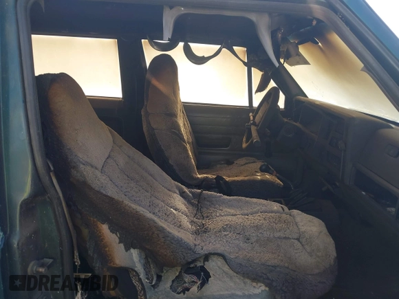 1996 Jeep Cherokee SE with VIN 1J4FT27P4TL309029, listed as a IAAI auction lot 42476830 with Not provided miles and . Bid and sale history available at DreamBid. Image 6.