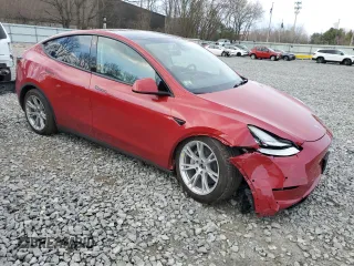 2022 Tesla Model Y Long Range z VIN 7SAYGDEE6NA019719, wystawiony jako Copart lot #52945125 z przebiegiem 9102 mil mil oraz Szkody całkowita. Historia ofert i sprzedaży dostępna na DreamBid. Obrazek 4.