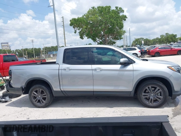 2020 Honda Ridgeline Sport with VIN 5FPYK3F19LB024180, listed as a IAAI auction lot 42399195 with 42,129 mi miles and . Bid and sale history available at DreamBid. Image 14.
