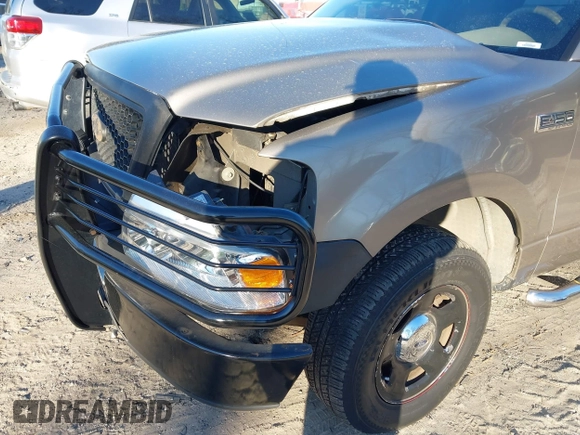 2005 Ford F-150 XLT with VIN 1FTPX12555NB05846, listed as a IAAI auction lot 41857253 with 226,219 mi miles. Bid and sale history available at carsss.com. Image 6.