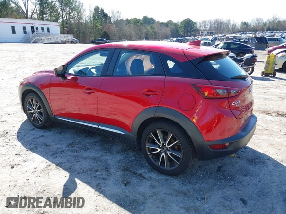 2016 Mazda CX-3 Grand Touring with VIN JM1DKFD72G0129096, listed as a IAAI auction lot 41592893 with 144,860 mi miles. Bid and sale history available at carsss.com. Image 3.