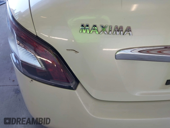 2014 Nissan Maxima SV z VIN 1N4AA5AP5EC482907, wystawiony jako IAAI lot #41885801 z przebiegiem 186 364 mil mil oraz . Historia ofert i sprzedaży dostępna na DreamBid. Obrazek 14.