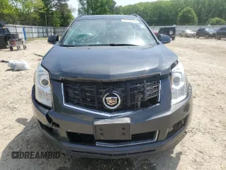 2015 Cadillac SRX z VIN 3GYFNAE31FS571500, wystawiony jako Copart lot #54106885 z przebiegiem 123 114 mil mil oraz Szkoda całkowita • Salvage title. Historia ofert i sprzedaży dostępna na DreamBid. Obrazek 5.