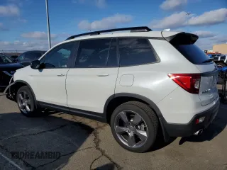 2021 Honda Passport Touring with VIN 5FNYF8H91MB027654, listed as a Copart auction lot 87270244 with 10,481 mi miles and Salvage Title. Bid and sale history available at carsss.com. Image 2.