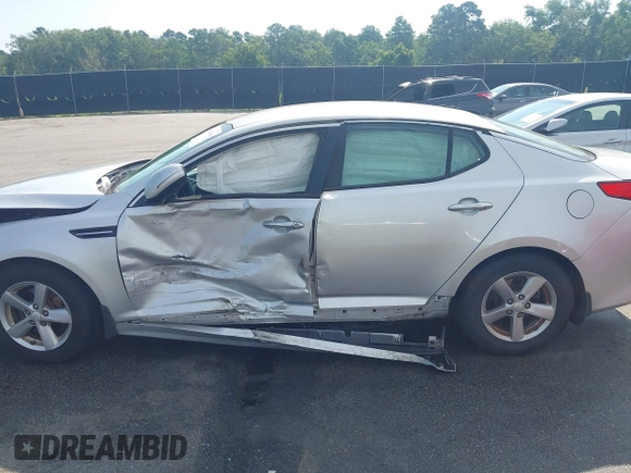 2015 Kia Optima LX with VIN 5XXGM4A75FG378795, listed as a IAAI auction lot 42604014 with 57,199 mi miles and . Bid and sale history available at DreamBid. Image 14.
