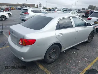 2009 Toyota Corolla with VIN 1NXBU40E39Z146748, listed as a IAAI auction lot 41523817 with 223,552 mi miles. Bid and sale history available at carsss.com. Image 4.