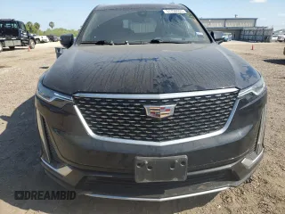 2021 Cadillac XT6 Premium Luxury with VIN 1GYKPCRS4MZ199110, listed as a Copart auction lot 51798905 with 66,486 mi miles and Salvage Title. Bid and sale history available at DreamBid. Image 5.