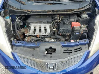 2009 Honda Fit Sport z VIN JHMGE88449S058618, wystawiony jako Copart lot #60717735 z przebiegiem 172 734 mil mil oraz Czysty tytuł • Clean title. Historia ofert i sprzedaży dostępna na DreamBid. Obrazek 11.