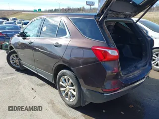 2020 Chevrolet Equinox LT with VIN 2GNAXUEV4L6250629, listed as a IAAI auction lot 41078037 with 168,259 mi miles and . Bid and sale history available at DreamBid. Image 3.