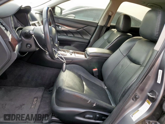 2015 Infiniti Q70 with VIN JN1BY1AR1FM561848, listed as a Copart auction lot 56432875 with 145,158 mi miles and Salvage title. Bid and sale history available at DreamBid. Image 7.