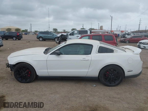 2012 Ford Mustang Premium z VIN 1ZVBP8AM6C5211096, wystawiony jako IAAI lot #41871346 z przebiegiem 236 649 mil mil oraz . Historia ofert i sprzedaży dostępna na DreamBid. Obrazek 15.