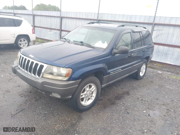 2002 Jeep Grand Cherokee Laredo with VIN 1J4GW48S22C244433, listed as a IAAI auction lot 41892912 with 256,393 mi miles. Bid and sale history available at carsss.com. Image 2.