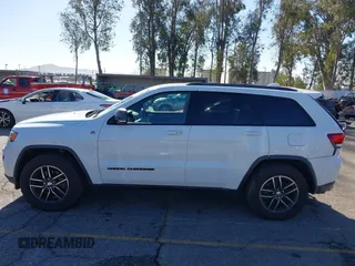 2017 Jeep Grand Cherokee Trailhawk with VIN 1C4RJFLGXHC959092, listed as a IAAI auction lot 41232281 with 108,659 mi miles and . Bid and sale history available at DreamBid. Image 14.