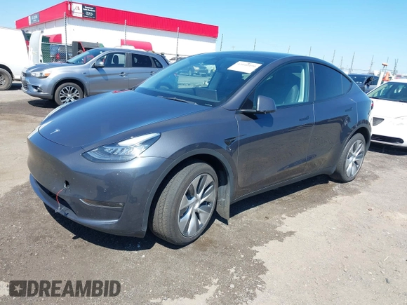 2022 Tesla Model Y Long Range with VIN 7SAYGDEE7NF426404, listed as a IAAI auction lot 42040490 with 39,635 mi miles and . Bid and sale history available at carsss.com. Image 20.