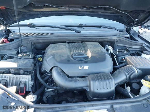 2015 Jeep Grand Cherokee Altitude with VIN 1C4RJFAG6FC796571, listed as a IAAI auction lot 41258471 with 104,049 mi miles. Bid and sale history available at carsss.com. Image 10.