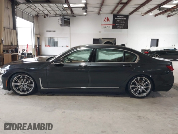 2022 BMW 7 Series 740i with VIN WBA7T2C07NCH14971, listed as a IAAI auction lot 41772487 with 28,382 mi miles. Bid and sale history available at carsss.com. Image 15.