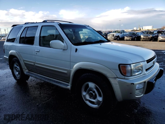 2000 Infiniti QX4 z VIN JNRAR07Y3YW084474, wystawiony jako Copart lot #87089994 z przebiegiem 237 974 mil mil oraz Szkody całkowita. Historia ofert i sprzedaży dostępna na DreamBid. Obrazek 4.