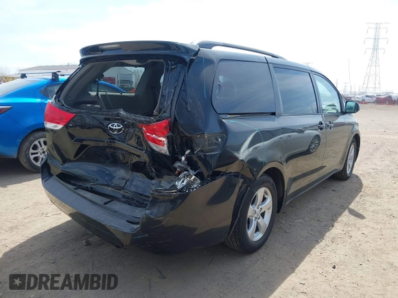 2014 Toyota Sienna LE AAS with VIN 5TDKK3DC6ES499478, listed as a IAAI auction lot 41918474 with 127,734 mi miles and . Bid and sale history available at carsss.com. Image 6.