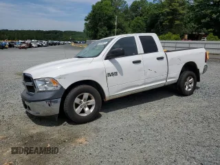2014 Ram 1500 Tradesman with VIN 1C6RR6FG7ES214829, listed as a Copart auction lot 56826825 with 144,987 mi miles and Salvage title. Bid and sale history available at DreamBid. Image 1.