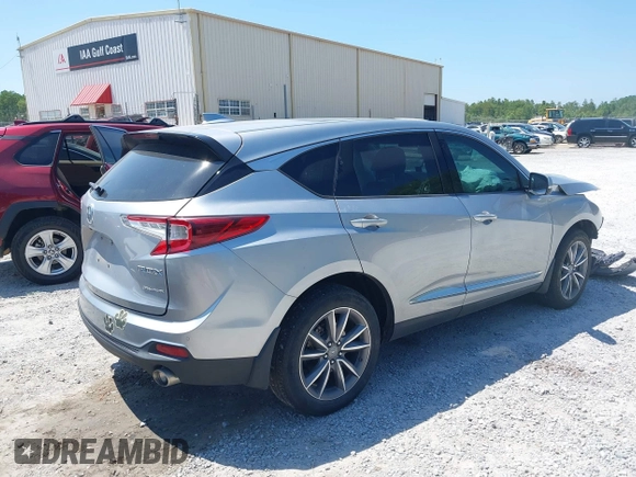 2019 Acura RDX Technology with VIN 5J8TC2H56KL028081, listed as a IAAI auction lot 40042142 with 76,899 mi miles and . Bid and sale history available at DreamBid. Image 4.