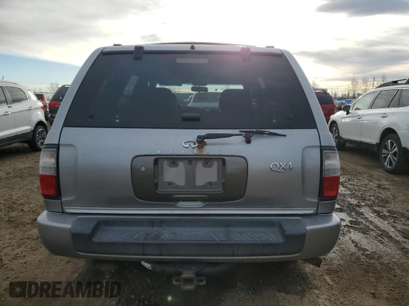 2000 Infiniti QX4 z VIN JNRAR07Y1YW083744, wystawiony jako Copart lot #80333404 z przebiegiem 191 863 mil mil oraz Czysty tytuł • Clean title. Historia ofert i sprzedaży dostępna na DreamBid. Obrazek 6.