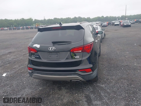 2017 Hyundai Santa Fe 2.4L with VIN 5NMZUDLB8HH009282, listed as a IAAI auction lot 42512122 with 81,744 mi miles and . Bid and sale history available at DreamBid. Image 16.