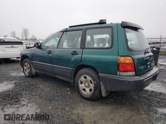1999 Subaru Forester L with VIN JF1SF6356XH732233, listed as a Copart auction lot 87039714 with 170,275 mi miles and Salvage Title. Bid and sale history available at carsss.com. Image 2.