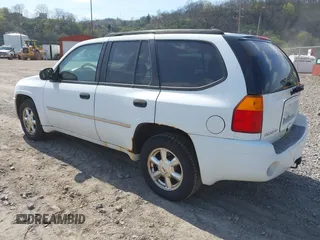 2008 GMC Envoy SLE2 with VIN 1GKDT13S682112642, listed as a IAAI auction lot 42062008 with 162,467 mi miles. Bid and sale history available at carsss.com. Image 3.
