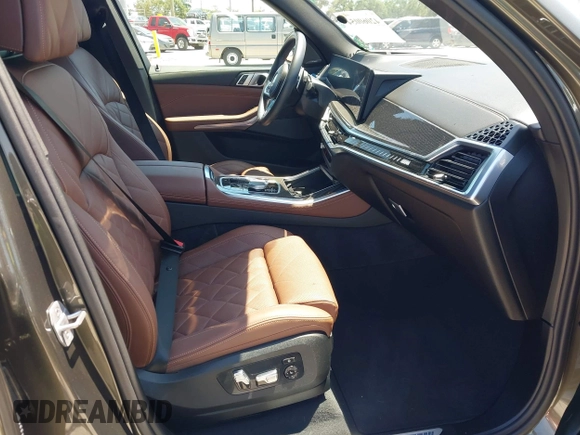2024 BMW X5 M60i with VIN 5UX33EU04R9U60278, listed as a IAAI auction lot 42060054 with 18,215 mi miles. Bid and sale history available at carsss.com. Image 5.