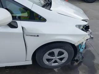 2015 Toyota Prius Four z VIN JTDKN3DU2F1915394, wystawiony jako IAAI lot #41648428 z przebiegiem 153 341 mil mil oraz . Historia ofert i sprzedaży dostępna na DreamBid. Obrazek 18.