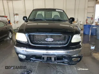 2003 Ford F-150 with VIN 2FTRF08L03CA03160, listed as a Copart auction lot 51591535 with 220,630 mi miles and Salvage title. Bid and sale history available at DreamBid. Image 5.
