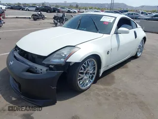 2004 Nissan 350Z Touring with VIN JN1AZ34D14M102966, listed as a IAAI auction lot 41921270 with 182,633 mi miles. Bid and sale history available at carsss.com. Image 2.