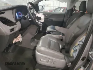 2017 Toyota Sienna XLE with VIN 5TDDZ3DC4HS166141, listed as a Copart auction lot 64357715 with 124,184 mi miles and Salvage title. Bid and sale history available at DreamBid. Image 7.
