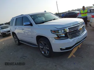 2016 Chevrolet Tahoe LTZ with VIN 1GNSKCKC9GR243895, listed as a IAAI auction lot 42322779 with 162,138 mi miles and . Bid and sale history available at DreamBid. Image 1.