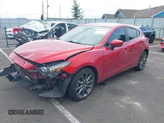 2018 Mazda 3 Touring with VIN 3MZBN1L33JM187560, listed as a IAAI auction lot 41692954 with 58,396 mi miles. Bid and sale history available at carsss.com. Image 18.
