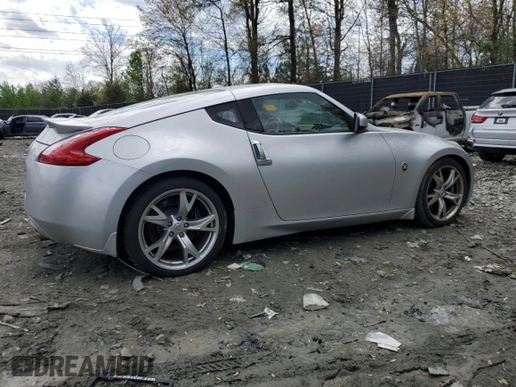 2010 Nissan 370Z with VIN JN1AZ4EH6AM505621, listed as a Copart auction lot 52745505 with 107,660 mi miles and Salvage Title. Bid and sale history available at carsss.com. Image 3.