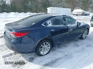 2016 Mazda 6 i Sport with VIN JM1GJ1U53G1407290, listed as a IAAI auction lot 41579668 with 131,527 mi miles and . Bid and sale history available at DreamBid. Image 4.