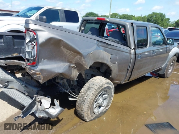 2003 Nissan Frontier XE with VIN 1N6ED29X73C424295, listed as a IAAI auction lot 42622922 with 200,599 mi miles and . Bid and sale history available at DreamBid. Image 4.