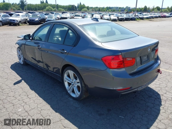 2012 BMW 3 Series 335i with VIN WBA3A9C5XCF077642, listed as a IAAI auction lot 42385611 with 119,251 mi miles and . Bid and sale history available at DreamBid. Image 3.