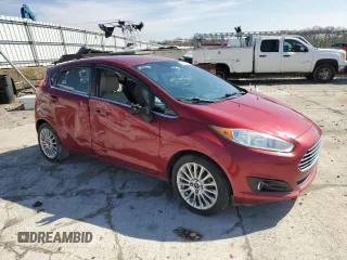 2014 Ford Fiesta Titanium z VIN 3FADP4FJ0EM156814, wystawiony jako Copart lot #52028435 z przebiegiem 97 985 mil mil oraz Szkoda całkowita • Salvage title. Historia ofert i sprzedaży dostępna na DreamBid. Obrazek 4.