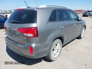 2015 Kia Sorento LX with VIN 5XYKTCA69FG584972, listed as a IAAI auction lot 42315973 with 165,907 mi miles and . Bid and sale history available at DreamBid. Image 4.