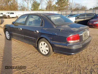 2003 Hyundai Sonata with VIN KMHWF25S93A887316, listed as a IAAI auction lot 41714217 with 299,890 mi miles. Bid and sale history available at carsss.com. Image 3.