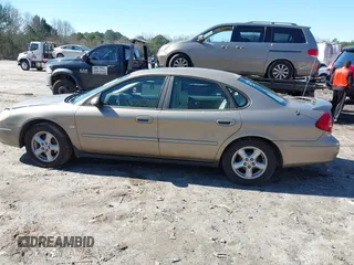2002 Ford Taurus SES Standard with VIN 1FAFP55S72A256247, listed as a IAAI auction lot 41584035 with 194,270 mi miles. Bid and sale history available at carsss.com. Image 14.