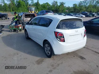 2013 Chevrolet Sonic LS with VIN 1G1JA6SH8D4130347, listed as a IAAI auction lot 42146150 with 144,120 mi miles and . Bid and sale history available at DreamBid. Image 3.