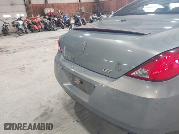 2007 Pontiac G6 GT z VIN 1G2ZH361X74127590, wystawiony jako IAAI lot #41828684 z przebiegiem 120 819 mil mil oraz . Historia ofert i sprzedaży dostępna na DreamBid. Obrazek 17.