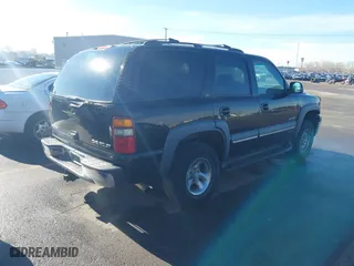 2002 Chevrolet Tahoe LT with VIN 1GNEK13Z72R137488, listed as a IAAI auction lot 41604813 with 200,037 mi miles. Bid and sale history available at carsss.com. Image 4.