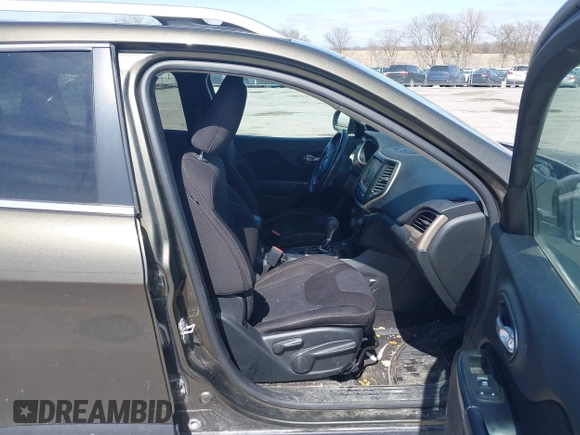 2015 Jeep Cherokee North with VIN 1C4PJMCS9FW588826, listed as a IAAI auction lot 41952883 with 145,586 mi miles. Bid and sale history available at carsss.com. Image 5.