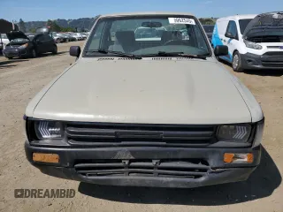1992 Toyota Pickup z VIN JT4RN81A1N0094217, wystawiony jako Copart lot #56062545 z przebiegiem 242 256 mil mil oraz Szkoda całkowita • Salvage title. Historia ofert i sprzedaży dostępna na DreamBid. Obrazek 5.